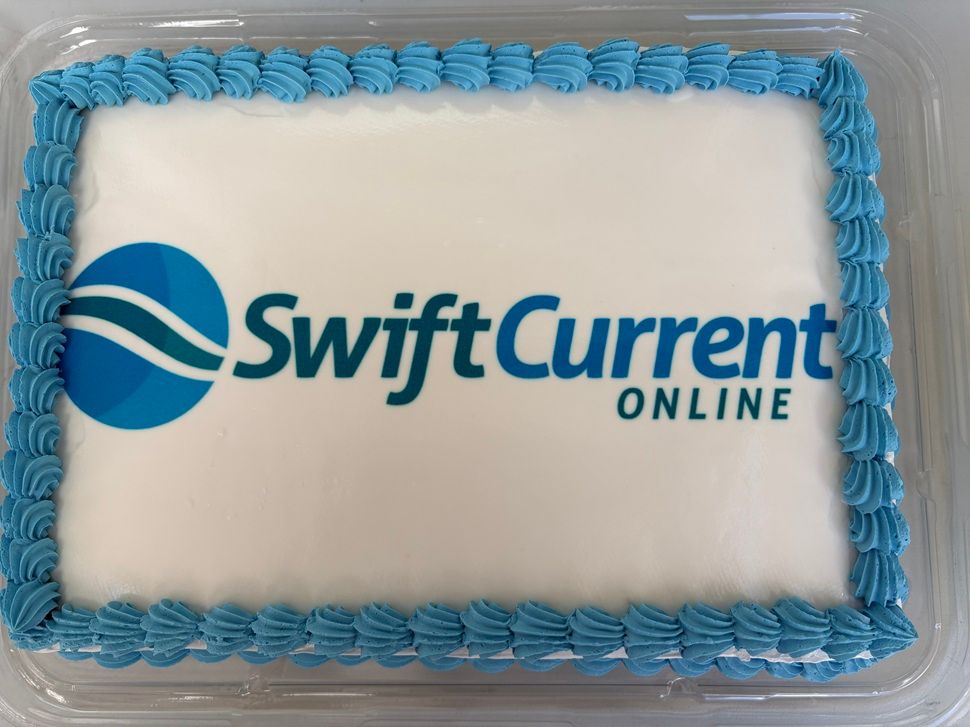 Three cakes were handed out in pieces to those who came out to celebrate the milestone.